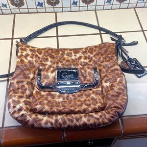 GUESS Leopard print shoulder bag. New condition. No rips tears or marks.